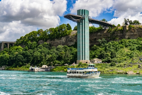 A picture of the maid of the mist, heading toward Niagara Falls.